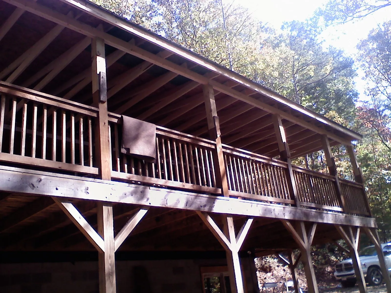 Timber framing under a new elevated porch and deck — Roof Leak Repair in Hometown by Roofing Brothers